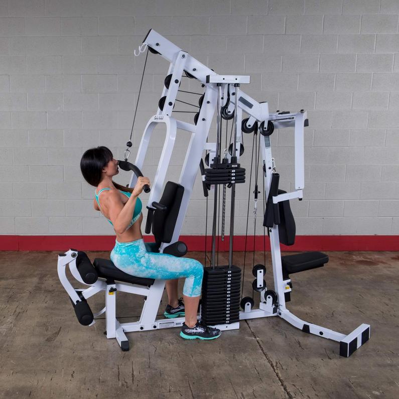 woman using the lat pulldown on the body solid exm2500s